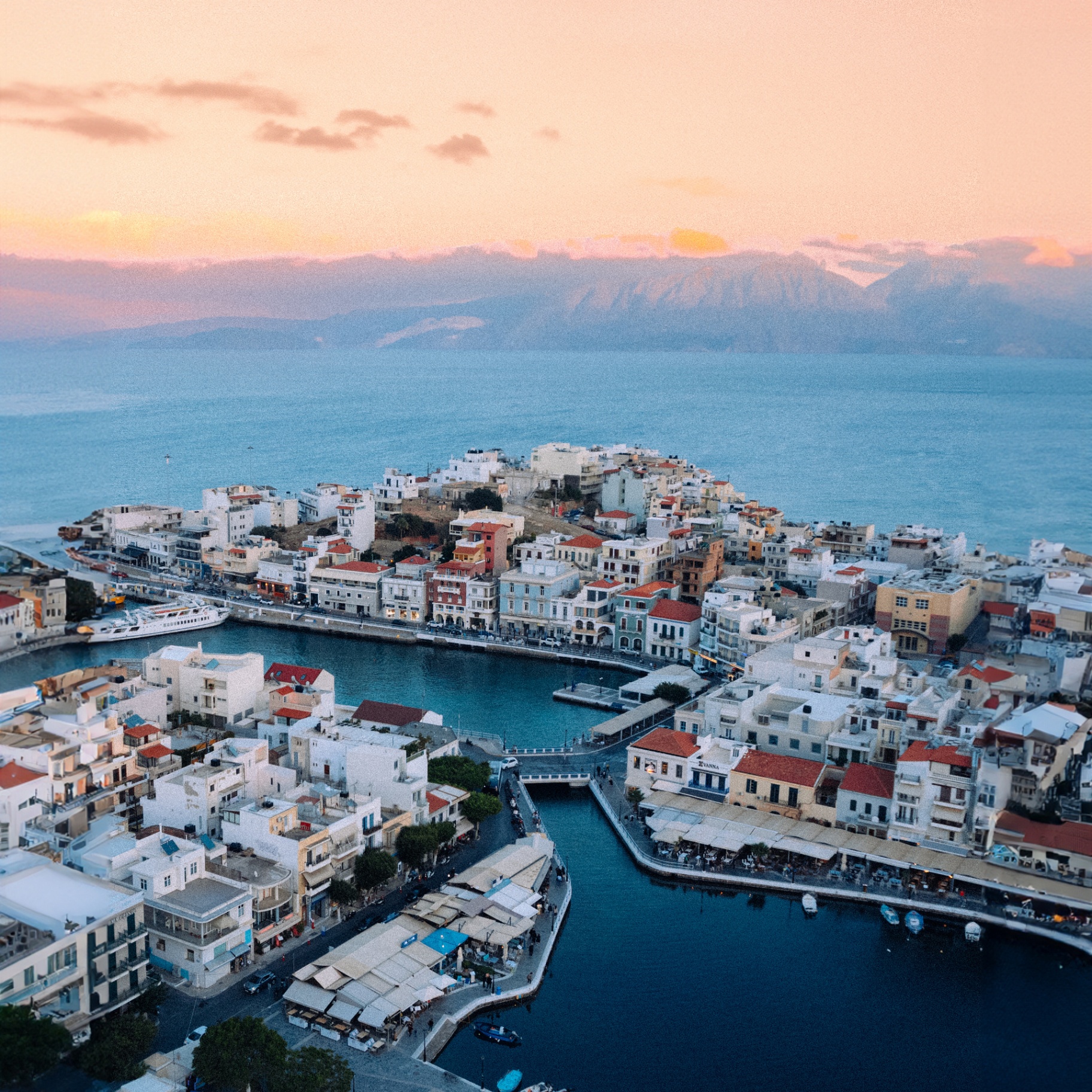 Aerial view of Agios Nikolaos harbor at sunset